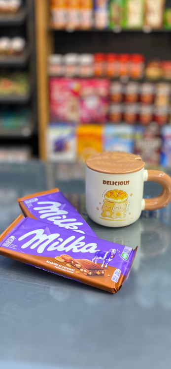 شکلات تبلتی میلکا با کرم کارامل و مغز بادام زمینی